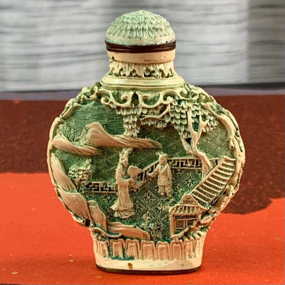 A highly sculptured Ivory container.